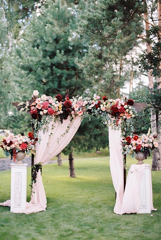 gorgeous marsalaburgundy and pink floral outdoor wedding arch ideas